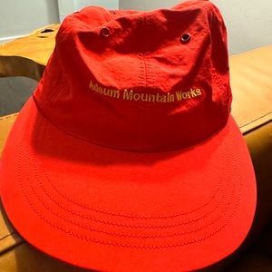 Men’s red flat brim hat adsum mountain Works